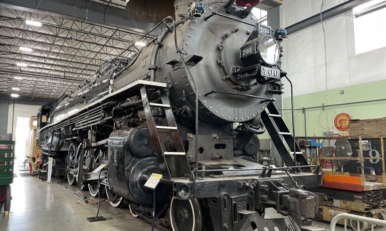 a steam locomotive inside a museum