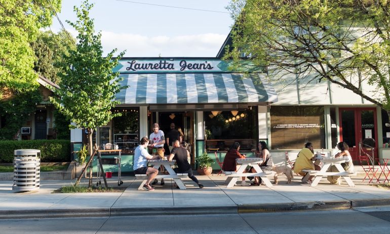 outside view of a restaurant with seating