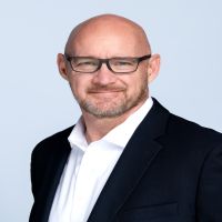 Headshot of Jon Hixon, CMP, CDME