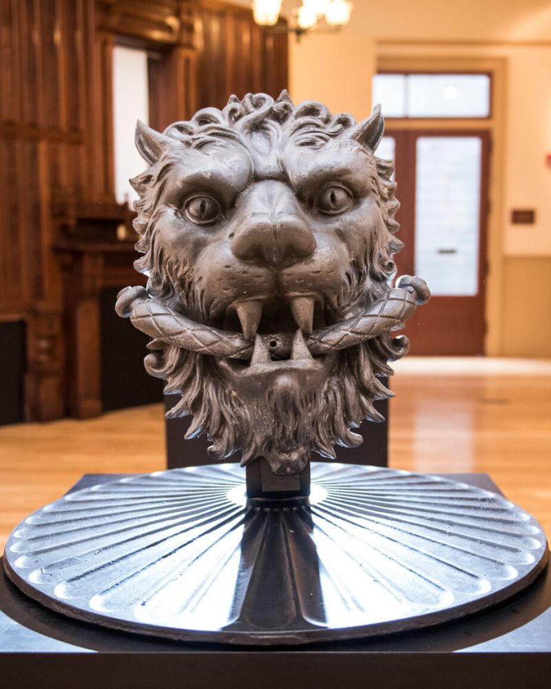 large lion head door knocker on exhibit at the Architectural Heritage Center