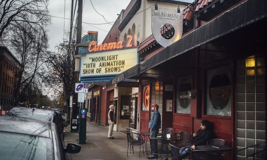 exterior of Cinema 21 with marquee showing what is playing in the theater