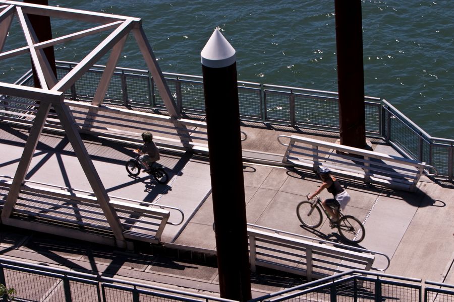 two bikers riding on the Eastbank Esplanade