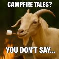 a goat with a marshmallow on a stick in its mouth