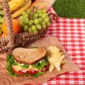 food on a blanket set out for a picnic