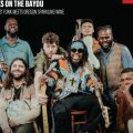 band with instruments smiling 