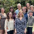 a group of people smiling