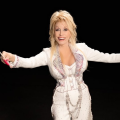 Dolly Parton in a sequined suit