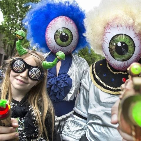 people in alien costumes