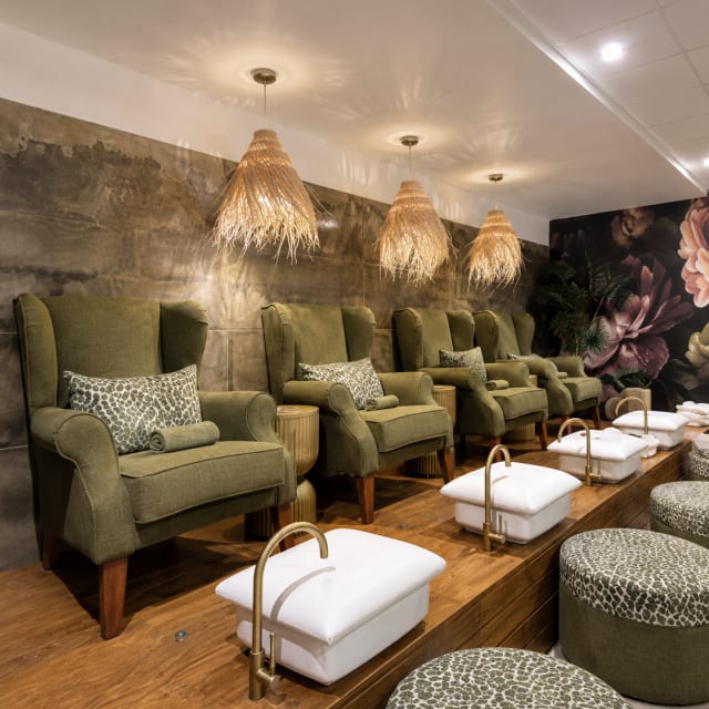 Pedicure lounge with plush chairs