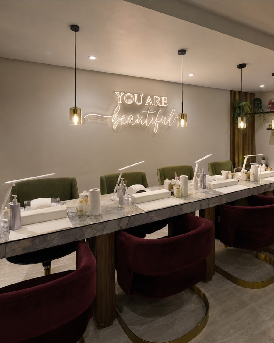 The nail bar beneath the “You are beautiful” signage