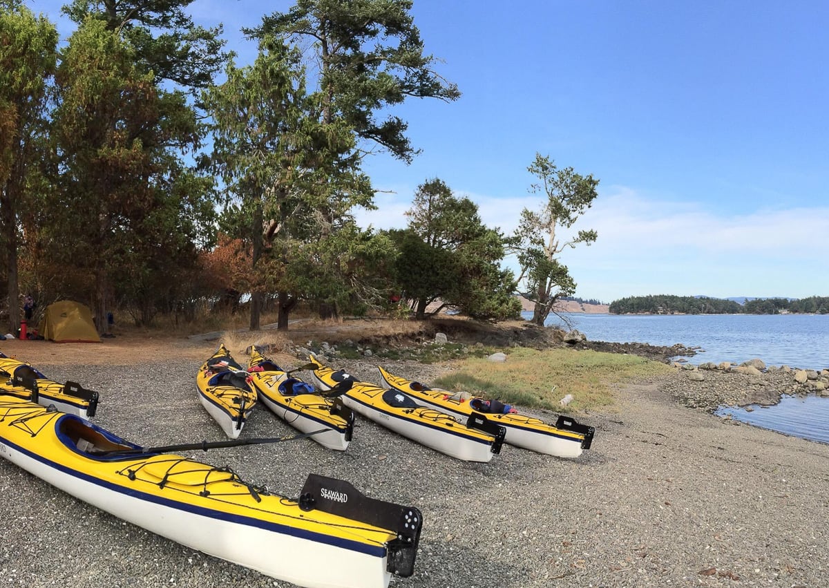 Sea Kayaks on a remote beach in the San Juan Islands.