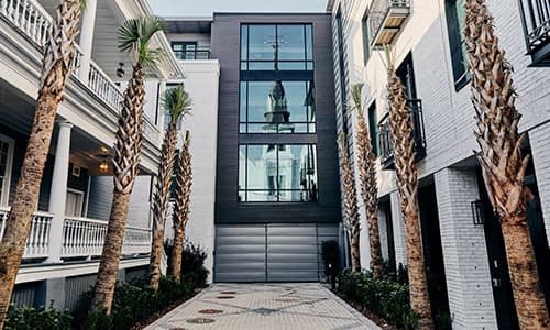 Hotel Bella Grace exterior shot with palm trees