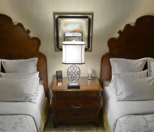 Double Queen Suite in Woolley's Classic Suites Hotel, Aurora Double Queen Suite in Woolley's Classic Suites Hotel, Aurora