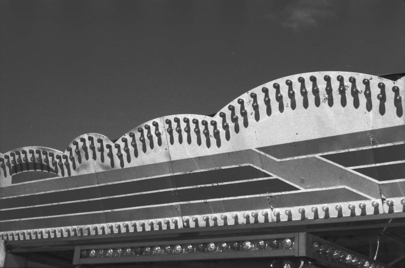 Black and white photograph of the top of a stall on Brighton Pier