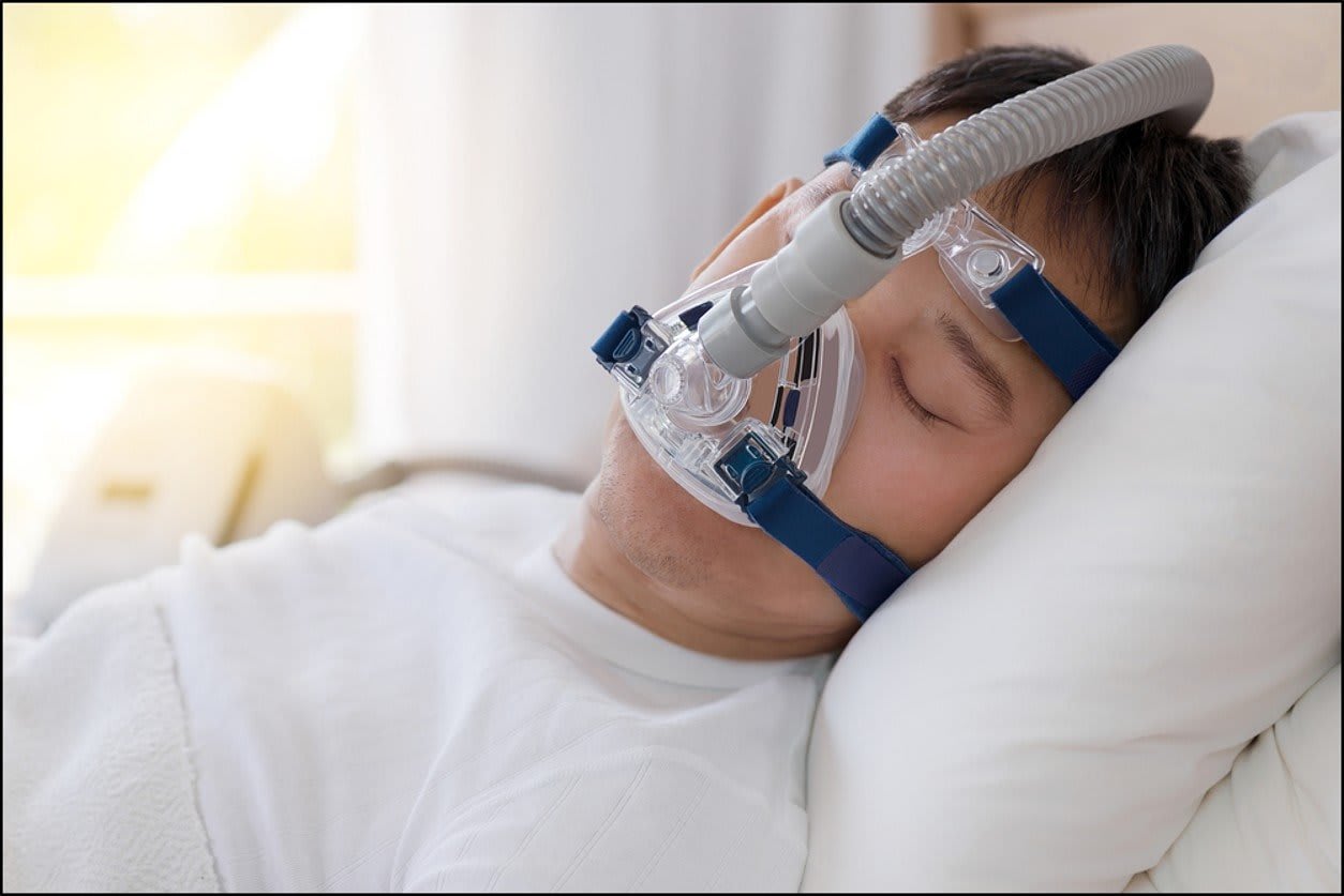 Guy with CPAP machine