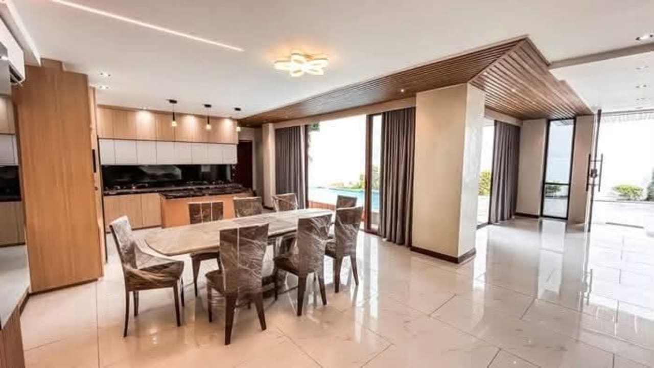 Modern kitchen and dining area in luxury 5-bedroom house in Vista Grande Cebu