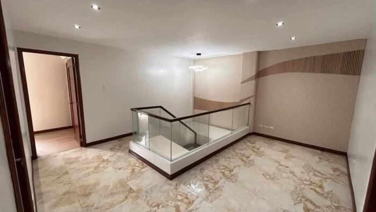 Elegant staircase with luxury lighting inside 5-bedroom house in Vista Grande Cebu City