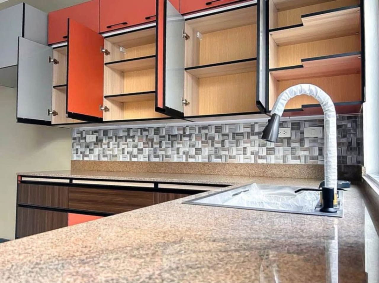 Kitchen with sink and cabinets in 4-bedroom townhouse for sale in Apas Cebu City