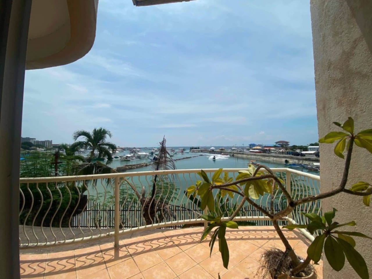Ocean and marina view from balcony of waterfront property in Mactan Cebu