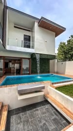 Private swimming pool with water features at luxury 5-bedroom home in Cebu City