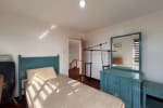 Bedroom facing the door and with blue cabinets in House & Lot for Sale in Liloan, Cebu