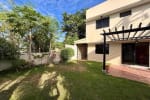 Outside view of the house with grass  and trees in House & Lot for Sale in Liloan, Cebu
