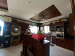 Kitchen with oven and sink inside waterfront house for sale in Mactan Cebu