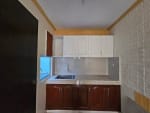 Renovated kitchen with built-in cabinets in townhouse for sale in Consolacion Cebu