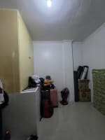 Storage room with bags and luggages with white walls house and lot for sale in Tisa