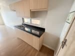 Studio condo kitchen with built-in cabinets at Solinea Tower 4 Cebu City