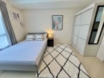 Furnished studio bedroom with double bed, built-in wardrobe and air conditioner at JTower Residences Mandaue City