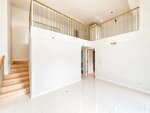 Interior staircase and open loft layout in a 2-bedroom condo for sale at Mandani Bay, Cebu