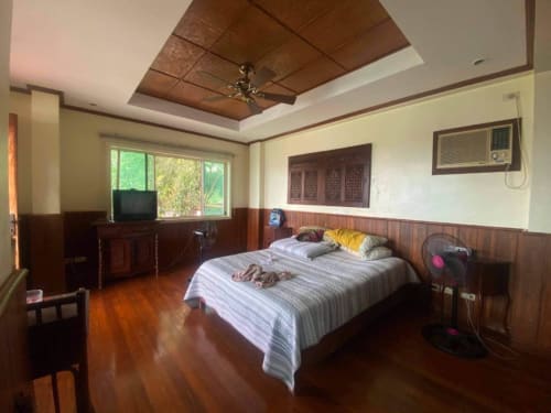 Bedroom inside waterfront house for sale on a 505 sqm property in Mactan Cebu