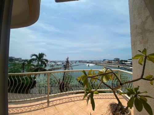 Ocean and marina view from balcony of waterfront property in Mactan Cebu