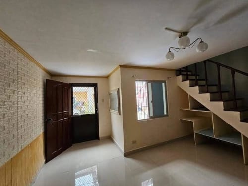 Living room entrance inside renovated 2-bedroom townhouse for sale in Consolacion Cebu