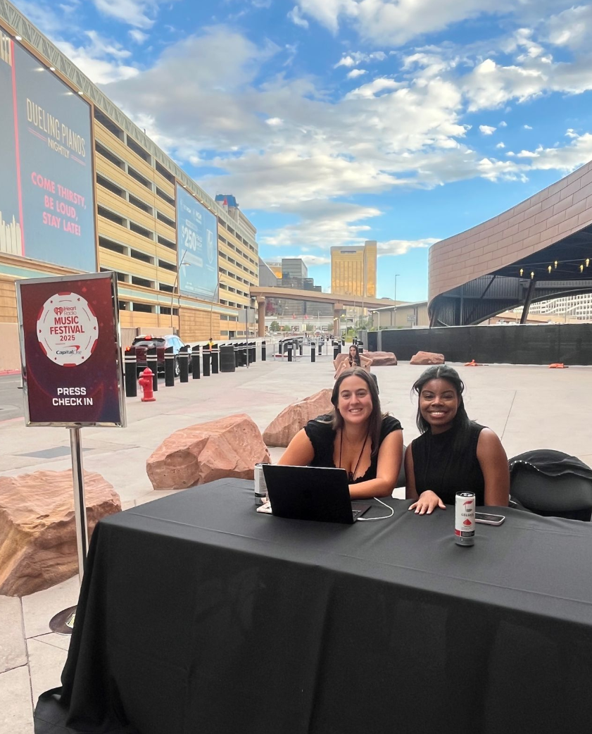 Media check-in hosts at the iHeartRadio Music Festival