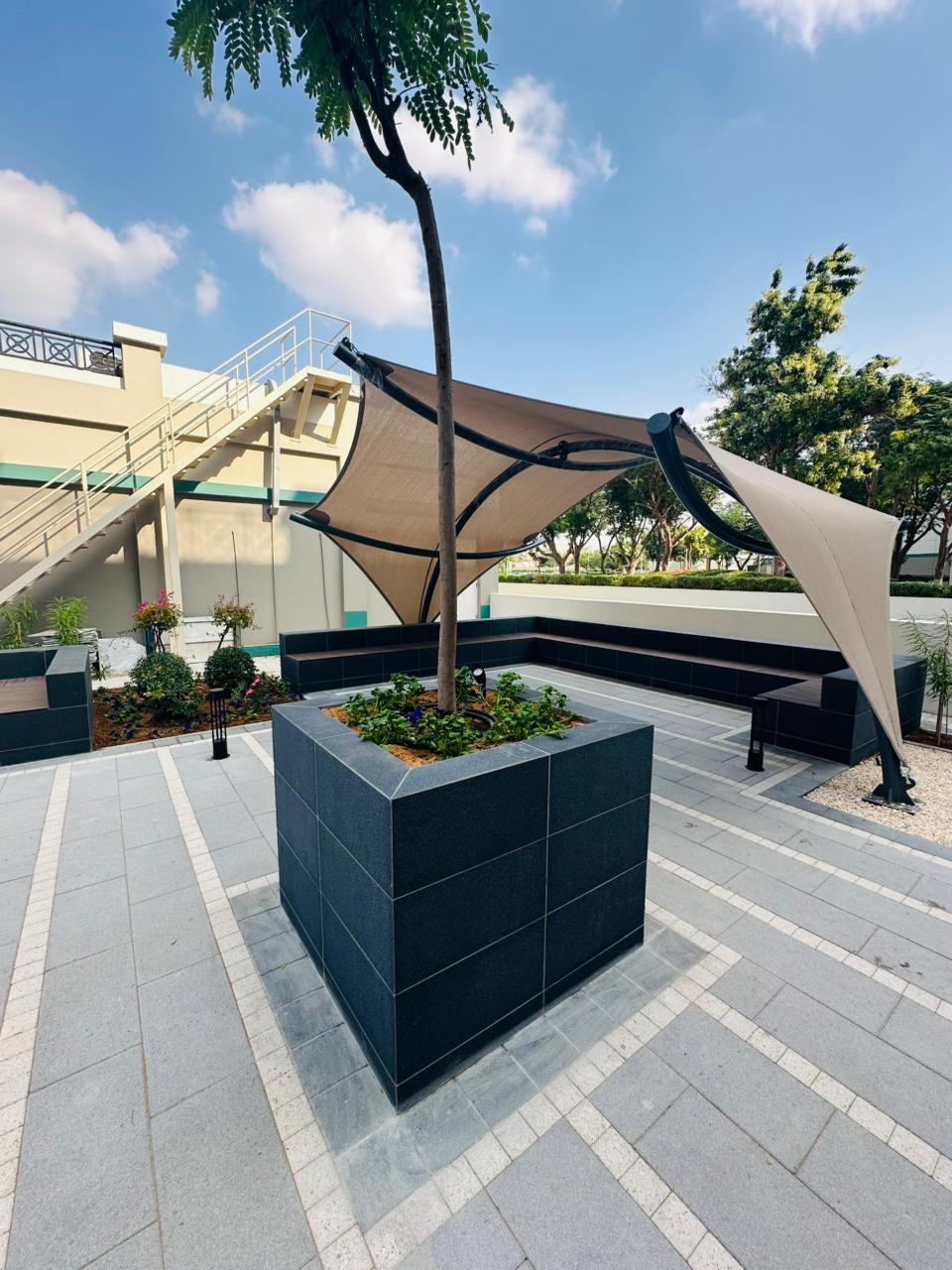 Entrance upgradation with seating and shaded area at Dubai International Academic City - Image 5