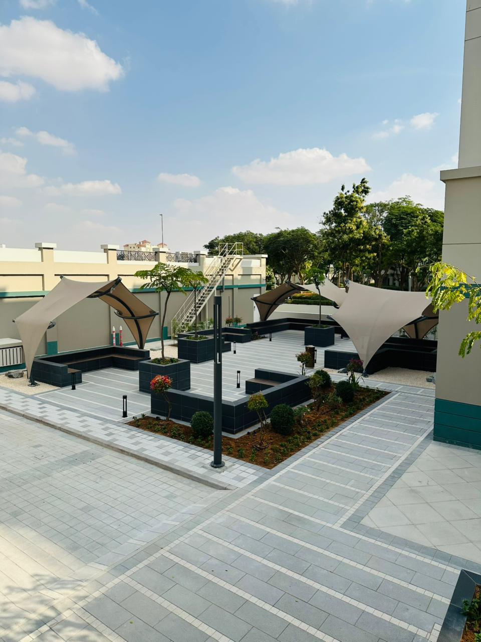 Entrance upgradation with seating and shaded area at Dubai International Academic City - Image 4