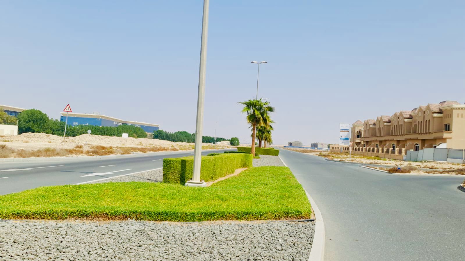 Road and roundabout landscape maintenance project in Dubai Industrial City main road - Photo 4