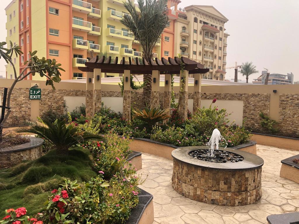 Landscape maintenance and water feature construction project in International City Dubai - Photo 3