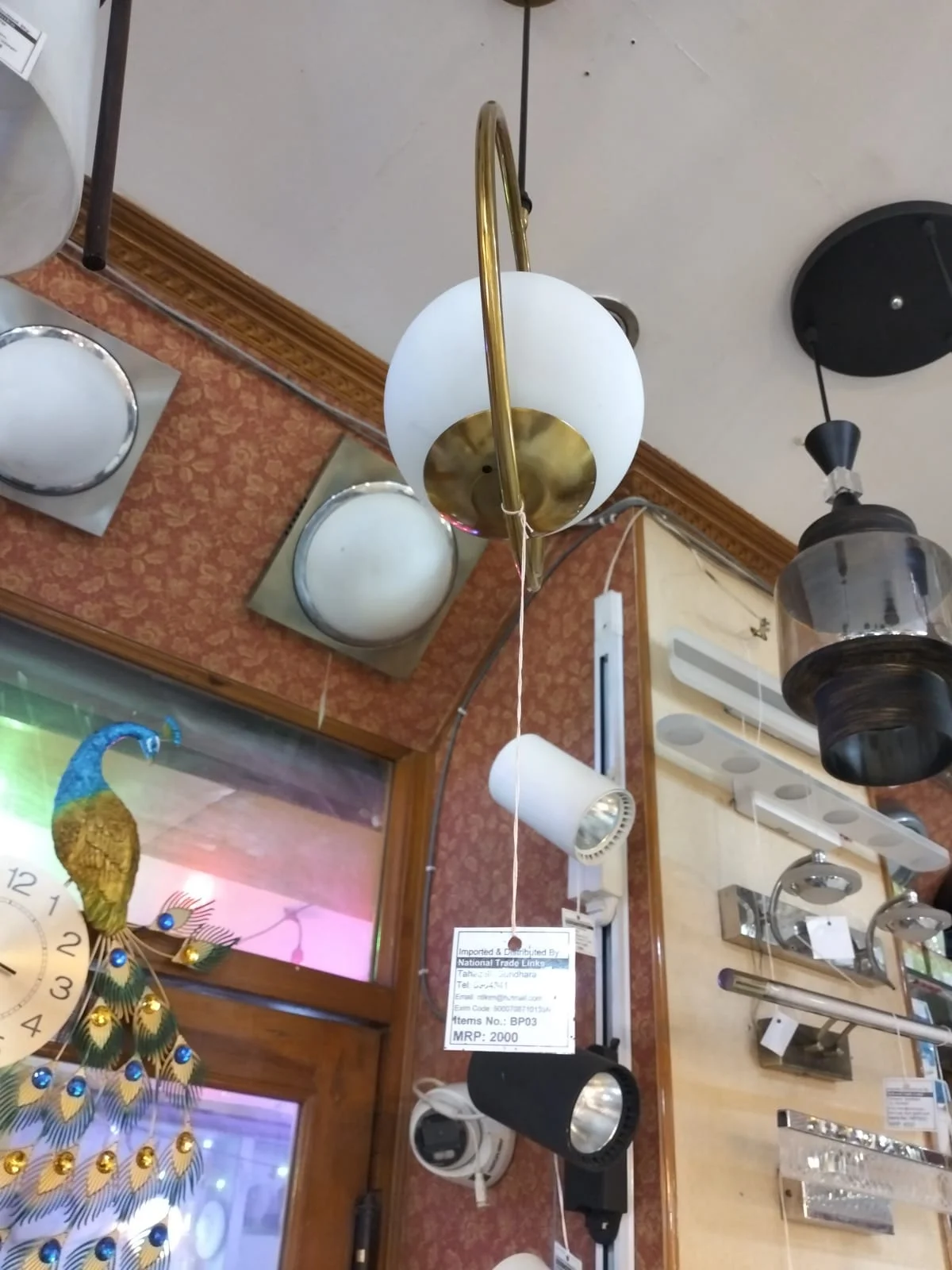 Modern Art Deco Milk Glass Sphere Wall Sconce with Curved Brass Arm - image 2