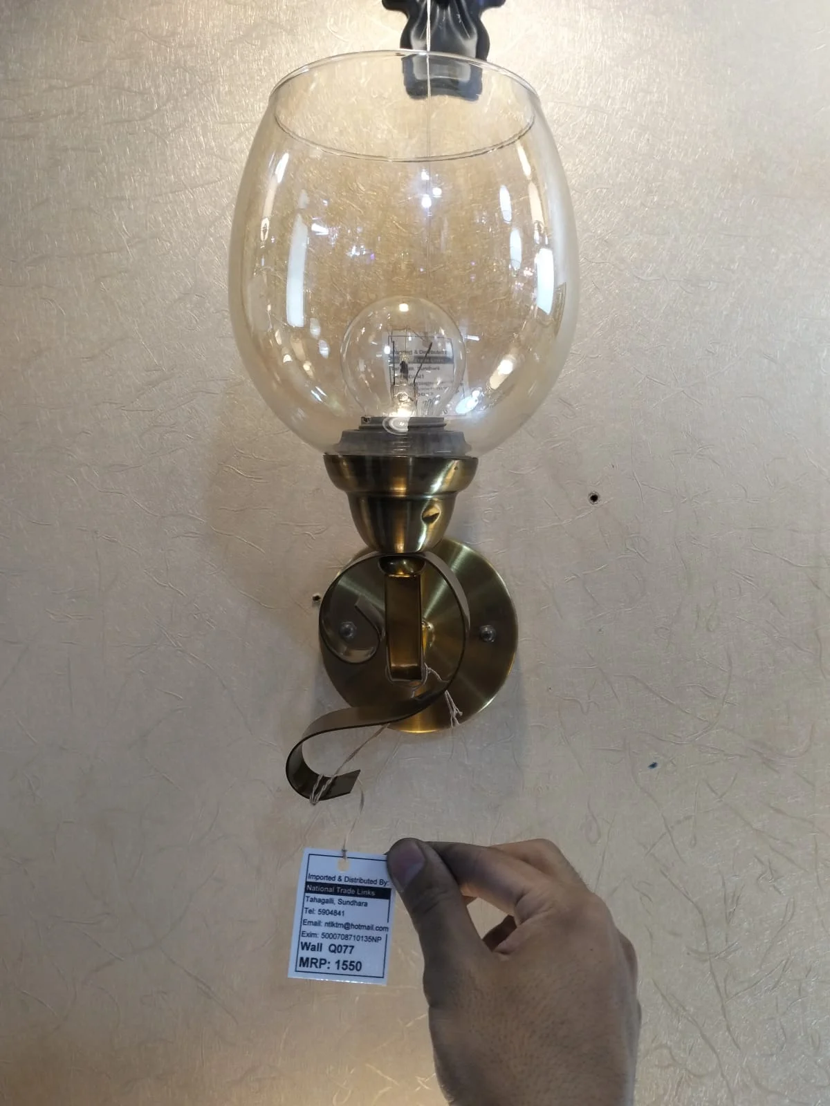Vintage-Inspired Globe Wall Sconce with Antique Brass Finish - image 2