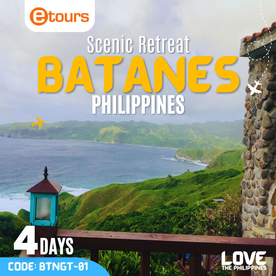 Batanes Scenic Retreat A breathtaking panoramic view of the rolling hills, rugged cliffs, and pristine beaches of Batanes Island.
