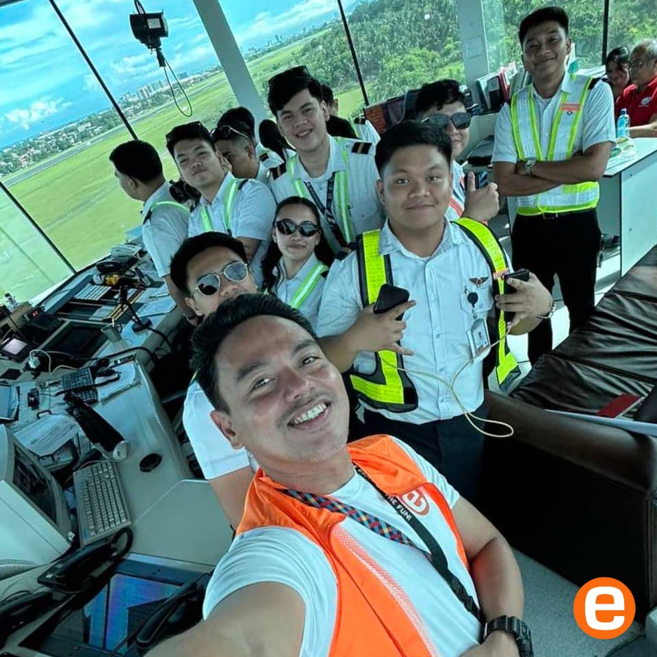 Etours tour guide with guests at air traffic controller davao airport