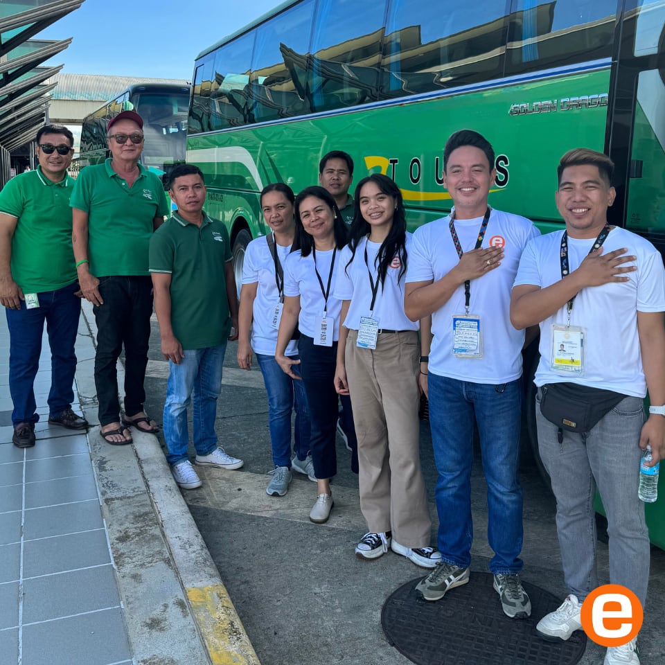 Etours staff with coach pilots before tour