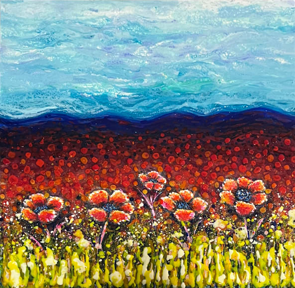 Red poppies in field