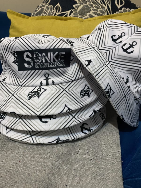 Sonke Siyahereza black and white bucket hat