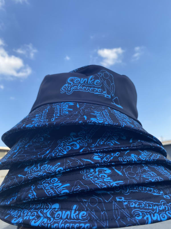 Sonke Siyahereza turquoise bucket hat