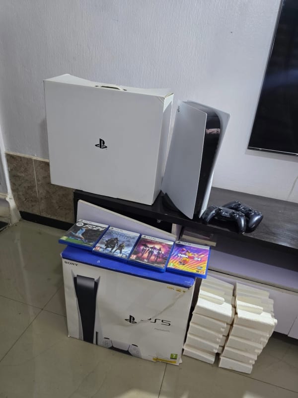 PS5 with 2 Pads, 4 Different CD Games (FC24, God Of War, NBA 2K24, Outsider) with stand and carton