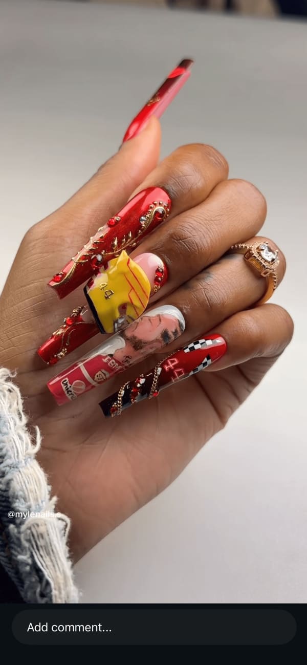 Long, Acrylic Nails with designs.